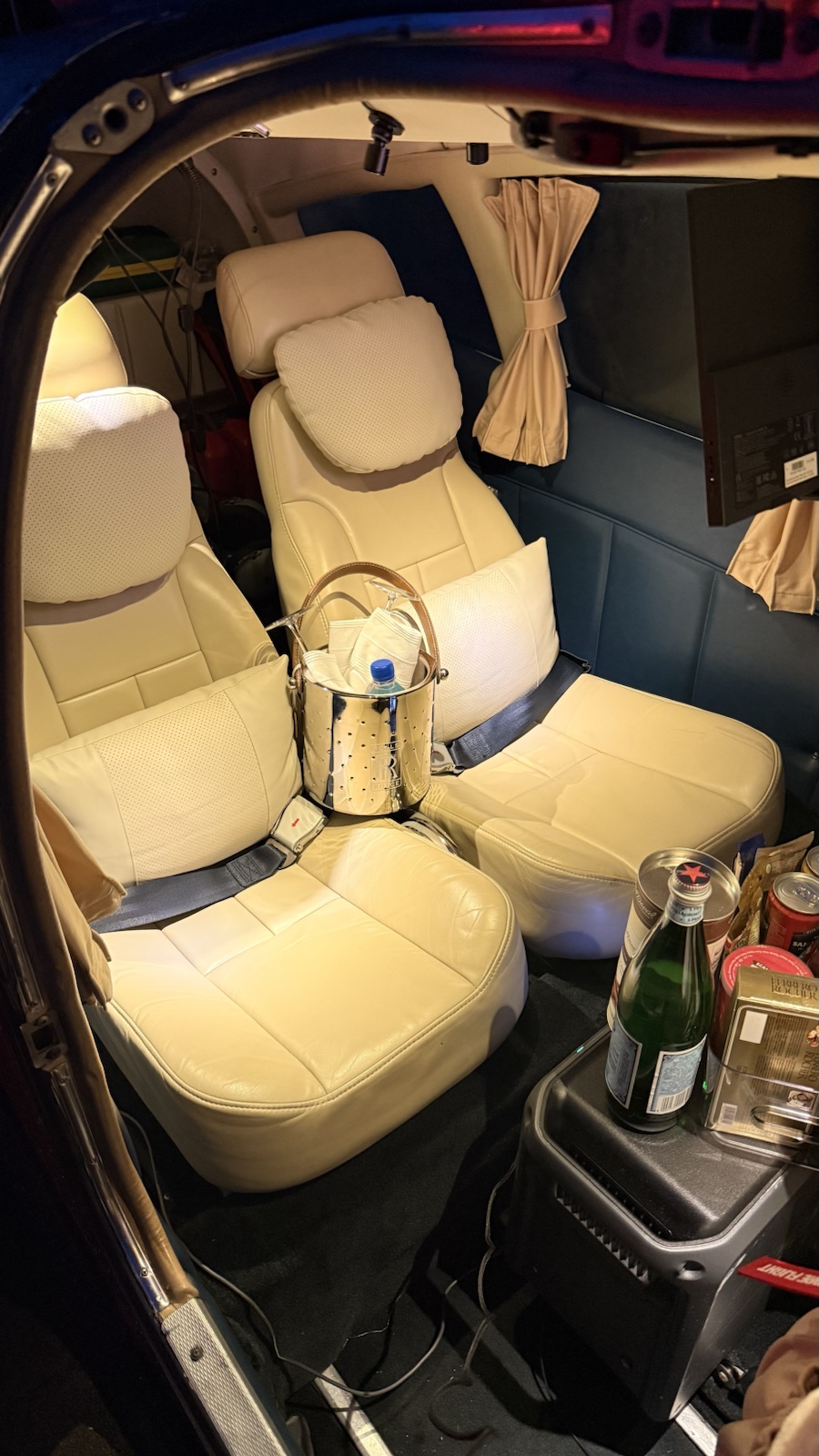 PA-28R rear passenger cabin viewed through the open aircraft door
